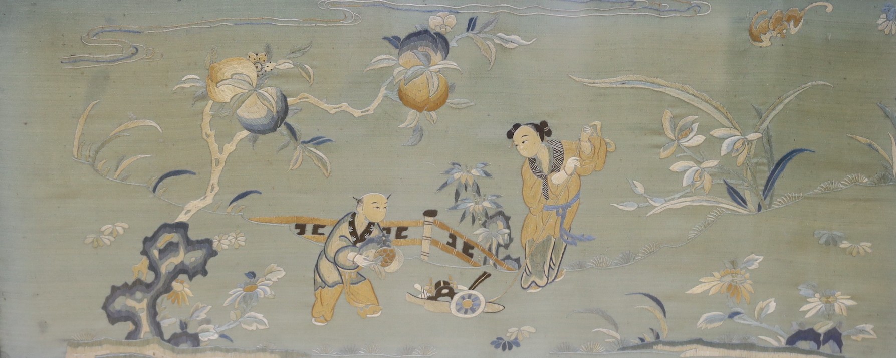 A 19th century framed Chinese polychrome silk embroidered panel, 68 cms wide x 34 cms high.